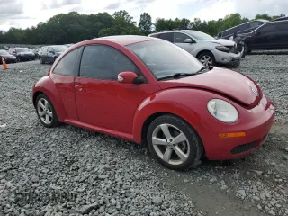 2010 Volkswagen Beetle with VIN 3VWRW3AG9AM025249, listed as a Copart auction lot 56785885 with 85,385 mi miles and Salvage title. Bid and sale history available at DreamBid. Image 4.