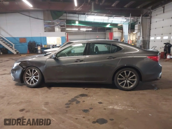 2019 Acura TLX z VIN 19UUB2F37KA009902, wystawiony jako IAAI lot #41974088 z przebiegiem 47 915 mil mil oraz . Historia ofert i sprzedaży dostępna na DreamBid. Obrazek 14.