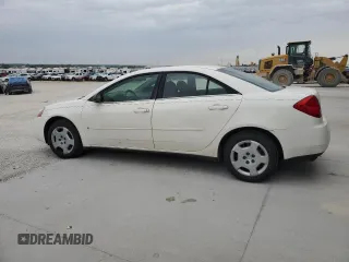 2006 Pontiac G6 1SV with VIN 1G2ZF55BX64264023, listed as a Copart auction lot 57665925 with 136,134 mi miles and Salvage title. Bid and sale history available at DreamBid. Image 2.
