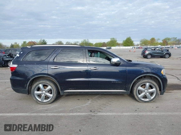 2011 Dodge Durango Citadel with VIN 1D4RE5GG5BC648477, listed as a IAAI auction lot 42129103 with 166,956 mi miles and . Bid and sale history available at DreamBid. Image 13.