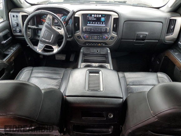 2018 GMC Sierra 3500HD Denali z VIN 1GT42YEY2JF254218, wystawiony jako Copart lot #85935094 z przebiegiem 157 907 mil mil oraz Szkody całkowita. Historia ofert i sprzedaży dostępna na DreamBid. Obrazek 8.