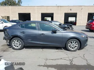 2015 Mazda Mazda3 i Touring with VIN 3MZBM1V74FM157512, listed as a IAAI auction lot 41844549 with 77,787 mi miles. Bid and sale history available at carsss.com. Image 14.