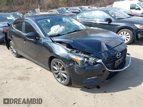 2018 Mazda 3 Touring with VIN 3MZBN1V34JM261565, listed as a IAAI auction lot 41795238 with 121,112 mi miles. Bid and sale history available at carsss.com. Image 1.