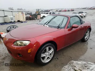 2007 Mazda MX-5 Miata Sport z VIN JM1NC25F670126833, wystawiony jako Copart lot #44402935 z przebiegiem 69 420 mil mil oraz Szkoda całkowita • Salvage title. Historia ofert i sprzedaży dostępna na DreamBid. Obrazek 1.