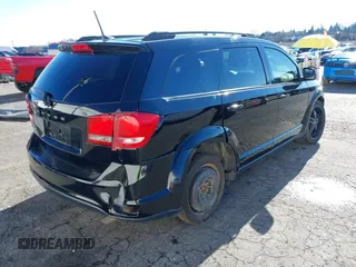 2019 Dodge Journey SE z VIN 3C4PDCBB1KT859686, wystawiony jako IAAI lot #41548860 z przebiegiem 68 955 mil mil oraz . Historia ofert i sprzedaży dostępna na DreamBid. Obrazek 4.