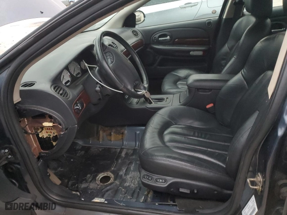 2003 Chrysler 300M with VIN 2C3HE66G63H513236, listed as a Copart auction lot 77491474 with 98,686 mi miles and Salvage Title. Bid and sale history available at carsss.com. Image 7.