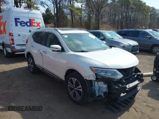 2017 Nissan Rogue SV with VIN 5N1AT2MV5HC873598, listed as a IAAI auction lot 41718074 with 63,467 mi miles. Bid and sale history available at carsss.com. Image 1.