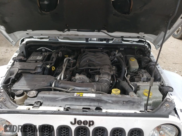 2015 Jeep Wrangler Unlimited Wrangler X with VIN 1C4BJWEG6FL614671, listed as a Copart auction lot 62286095 with 94,928 mi miles and Salvage title. Bid and sale history available at DreamBid. Image 12.