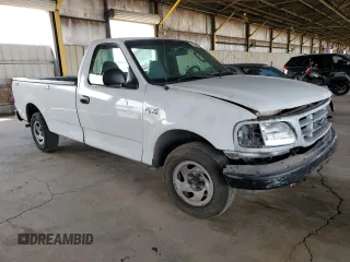2003 Ford F-150 XL with VIN 1FTRF17243NB73840, listed as a Copart auction lot 58356935 with 332,670 mi miles and Salvage title. Bid and sale history available at DreamBid. Image 4.