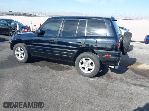 1999 Toyota RAV4 with VIN JT3GP10V9X7058125, listed as a IAAI auction lot 42056633 with 247,015 mi miles and . Bid and sale history available at DreamBid. Image 3.