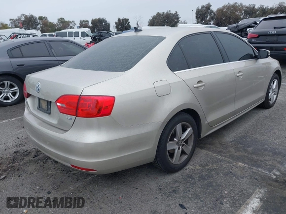 2014 Volkswagen Jetta TDI w/Premium with VIN 3VWLL7AJ3EM231190, listed as a IAAI auction lot 41722137 with 100,965 mi miles and . Bid and sale history available at DreamBid. Image 4.