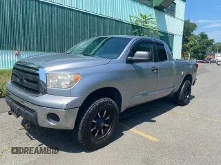 2010 Toyota Tundra with VIN 5TFUM5F11AX01281, listed as a Copart auction lot 66980935 with 308,906 mi miles and Clean title. Bid and sale history available at DreamBid. Image 2.