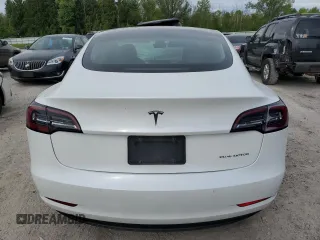 2020 Tesla Model 3 Long Range z VIN 5YJ3E1EB9LF801059, wystawiony jako Copart lot #58312495 z przebiegiem Nie podano mil oraz Szkoda całkowita • Salvage title. Historia ofert i sprzedaży dostępna na DreamBid. Obrazek 6.