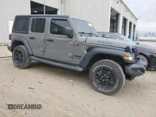 2020 Jeep Wrangler Unlimited Willys with VIN 1C4HJXDM2LW345683, listed as a Copart auction lot 57156215 with Not provided miles and Salvage title. Bid and sale history available at DreamBid. Image 4.