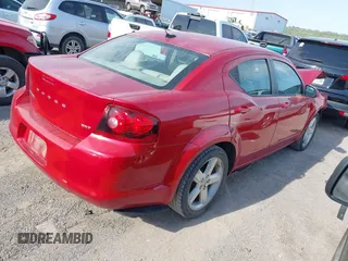 2013 Dodge Avenger SXT with VIN 1C3CDZCB1DN682290, listed as a IAAI auction lot 41964841 with 156,511 mi miles and . Bid and sale history available at carsss.com. Image 4.