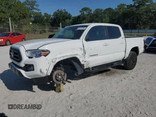 2023 Toyota Tacoma SR5 z VIN 3TMAZ5CN3PM212056, wystawiony jako Copart lot #57217735 z przebiegiem 36 533 mil mil oraz Szkoda całkowita • Salvage title. Historia ofert i sprzedaży dostępna na DreamBid. Obrazek 1.