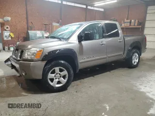 2007 Nissan Titan LE with VIN 1N6BA07B67N225787, listed as a Copart auction lot 46987835 with 211,755 mi miles and Salvage Title. Bid and sale history available at carsss.com. Image 1.