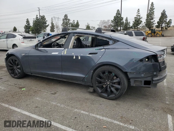 2014 Tesla Model S 60 with VIN 5YJSA1S14EFP56277, listed as a Copart auction lot 57162685 with Not provided miles and Salvage title. Bid and sale history available at DreamBid. Image 2.