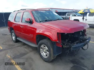 2013 Chevrolet Tahoe LS with VIN 1GNSCAE00DR359498, listed as a IAAI auction lot 40125477 with 156,100 mi miles and . Bid and sale history available at DreamBid. Image 1.