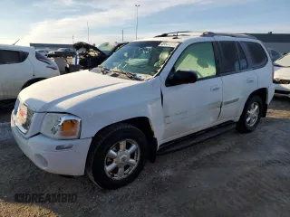 2005 GMC Envoy SLT with VIN 1GKDT13S452369908, listed as a Copart auction lot 49643375 with 0 mi miles and Salvage Title. Bid and sale history available at carsss.com. Image 1.