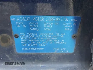 2002 Suzuki Aerio SX z VIN JS2RC41H825105469, wystawiony jako IAAI lot #41829735 z przebiegiem Nie podano mil oraz . Historia ofert i sprzedaży dostępna na DreamBid. Obrazek 9.