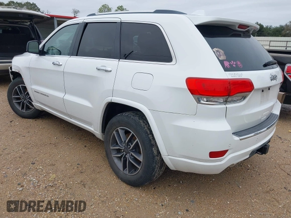 2014 Jeep Grand Cherokee Overland with VIN 1C4RJECG4EC543092, listed as a IAAI auction lot 40981315 with 149,096 mi miles. Bid and sale history available at carsss.com. Image 3.