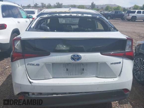 2022 Toyota Prius L Eco with VIN JTDKAMFUXN3181752, listed as a IAAI auction lot 42015717 with 129,637 mi miles and . Bid and sale history available at DreamBid. Image 16.