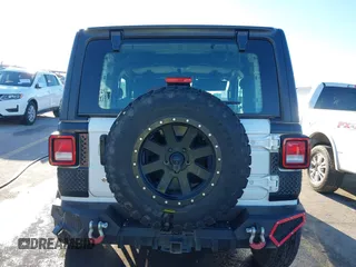 2021 Jeep Wrangler Sport S with VIN 1C4GJXAN2MW663880, listed as a IAAI auction lot 41059915 with 83,867 mi miles and . Bid and sale history available at DreamBid. Image 16.