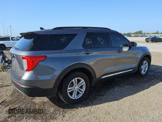 2022 Ford Explorer XLT with VIN 1FMSK8DH7NGA82496, listed as a Copart auction lot 51866865 with 77,014 mi miles and Clean Title. Bid and sale history available at carsss.com. Image 3.