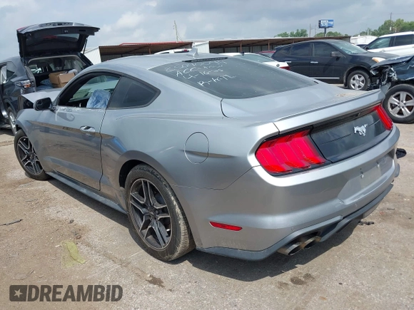 2020 Ford Mustang EcoBoost z VIN 1FA6P8TH2L5186210, wystawiony jako IAAI lot #42103657 z przebiegiem 68 790 mil mil oraz . Historia ofert i sprzedaży dostępna na DreamBid. Obrazek 3.