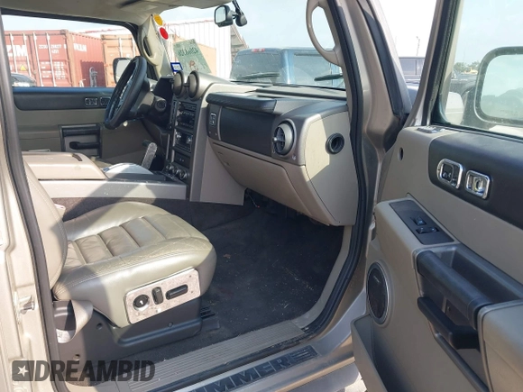 2003 Hummer H2 with VIN 5GRGN23U23H148326, listed as a IAAI auction lot 42068326 with 149,396 mi miles. Bid and sale history available at carsss.com. Image 5.