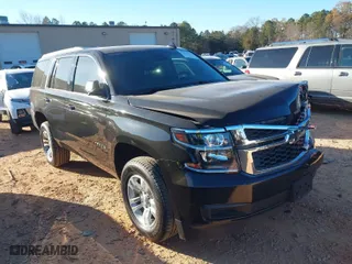 2019 Chevrolet Tahoe LT with VIN 1GNSKBKC2KR365355, listed as a IAAI auction lot 41032993 with 250,419 mi miles. Bid and sale history available at carsss.com. Image 1.
