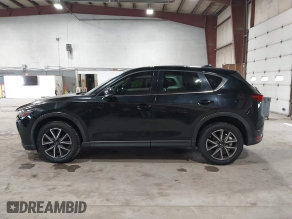 2017 Mazda CX-5 Grand Touring with VIN JM3KFBDL6H0143013, listed as a IAAI auction lot 41912979 with 122,890 mi miles. Bid and sale history available at carsss.com. Image 14.