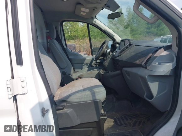 2015 Ford Transit Cargo z VIN 1FTNR1ZM5FKA65799, wystawiony jako IAAI lot #42473586 z przebiegiem 99 756 mil mil oraz . Historia ofert i sprzedaży dostępna na DreamBid. Obrazek 5.