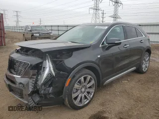 2022 Cadillac XT4 AWD Premium Luxury z VIN 1GYFZDR43NF132553, wystawiony jako Copart lot #50869955 z przebiegiem 25 412 mil mil oraz Szkody całkowita. Historia ofert i sprzedaży dostępna na DreamBid. Obrazek 1.