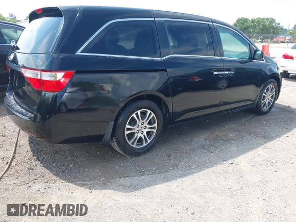 2011 Honda Odyssey EX-L with VIN 5FNRL5H69BB037248, listed as a IAAI auction lot 42613070 with 101,008 mi miles and . Bid and sale history available at DreamBid. Image 4.