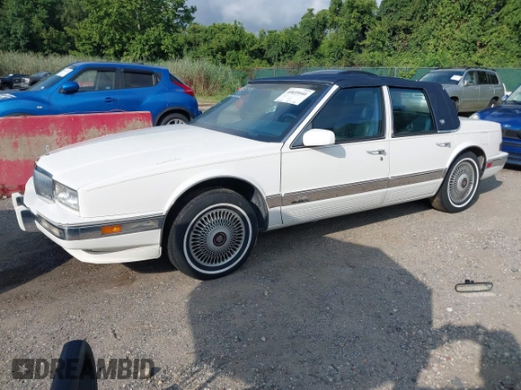 1991 Cadillac Seville z VIN 1G6KS53B9MU820155, wystawiony jako IAAI lot #40035441 z przebiegiem 78 021 mil mil oraz . Historia ofert i sprzedaży dostępna na DreamBid. Obrazek 2.