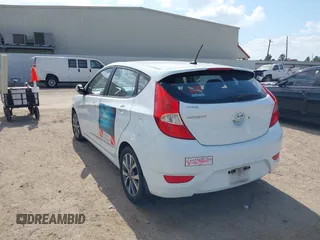 2015 Hyundai Accent Sport with VIN KMHCU5AE5FU201477, listed as a IAAI auction lot 41529347 with 189,774 mi miles. Bid and sale history available at carsss.com. Image 3.