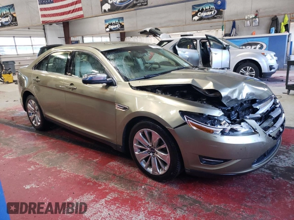 2012 Ford Taurus Limited with VIN 1FAHP2JW3CG142762, listed as a Copart auction lot 77864584 with 131,911 mi miles and Salvage title. Bid and sale history available at DreamBid. Image 4.