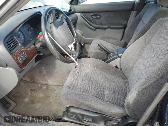 2000 Subaru Legacy Outback with VIN 4S3BH6750Y6616991, listed as a Copart auction lot 43860405 with 206,287 mi miles and Salvage title. Bid and sale history available at DreamBid. Image 7.