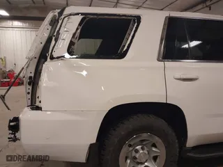 2015 Chevrolet Tahoe Commercial with VIN 1GNSK2EC5FR688820, listed as a IAAI auction lot 41444813 with 206,244 mi miles. Bid and sale history available at carsss.com. Image 18.
