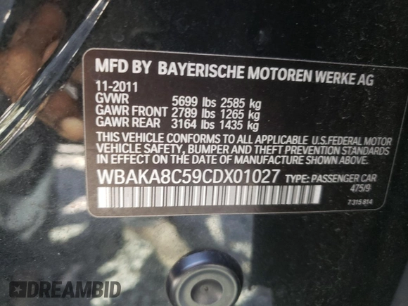 2012 BMW 7 Series 750i with VIN WBAKA8C59CDX01027, listed as a Copart auction lot 57881955 with 171,992 mi miles and Clean title. Bid and sale history available at DreamBid. Image 12.