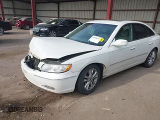 2007 Hyundai Azera SE with VIN KMHFC46F07A139369, listed as a IAAI auction lot 41999327 with 145,827 mi miles and . Bid and sale history available at DreamBid. Image 2.