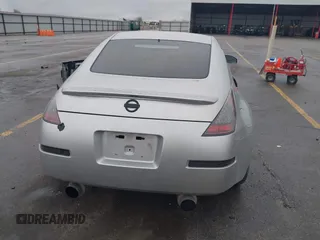 2003 Nissan 350Z Touring z VIN JN1AZ34E43T014247, wystawiony jako IAAI lot #42120812 z przebiegiem 112 263 mil mil oraz . Historia ofert i sprzedaży dostępna na DreamBid. Obrazek 16.