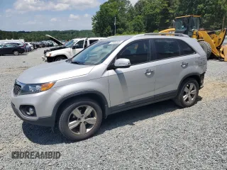 2013 Kia Sorento EX with VIN 5XYKU4A60DG406254, listed as a Copart auction lot 61552895 with 128,141 mi miles and Salvage title. Bid and sale history available at DreamBid. Image 1.