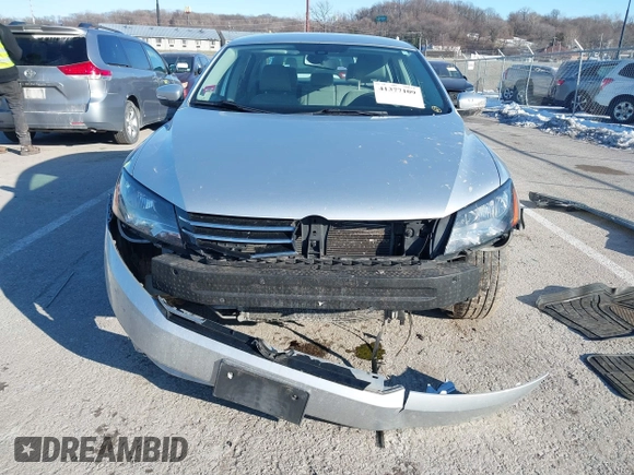 2014 Volkswagen Passat S w/Nav with VIN 1VWAP7A35EC052552, listed as a IAAI auction lot 41377109 with 123,273 mi miles. Bid and sale history available at carsss.com. Image 6.