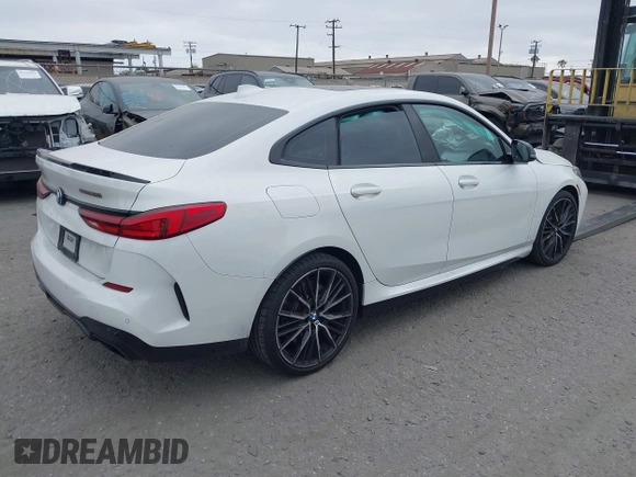 2022 BMW 2 Series M235i xDrive with VIN WBA13AL0XN7J95517, listed as a IAAI auction lot 42682823 with 16,069 mi miles and . Bid and sale history available at DreamBid. Image 4.