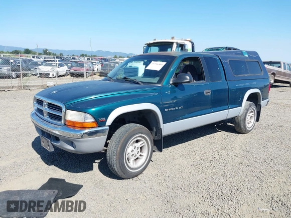 1999 Dodge Dakota SLT with VIN 1B7GG22Y2XS157214, listed as a IAAI auction lot 39776504 with 144,928 mi miles and . Bid and sale history available at carsss.com. Image 17.