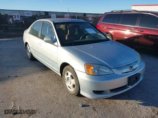 2003 Honda Civic Hybrid with VIN JHMES956X3S019115, listed as a IAAI auction lot 41214960 with 303,472 mi miles. Bid and sale history available at carsss.com. Image 6.
