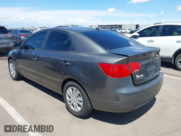 2013 Kia Forte EX with VIN KNAFU4A27D5724120, listed as a IAAI auction lot 42153084 with 154,860 mi miles. Bid and sale history available at carsss.com. Image 3.